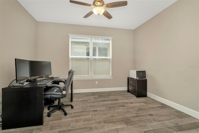 office space with ceiling fan and light hardwood / wood-style flooring