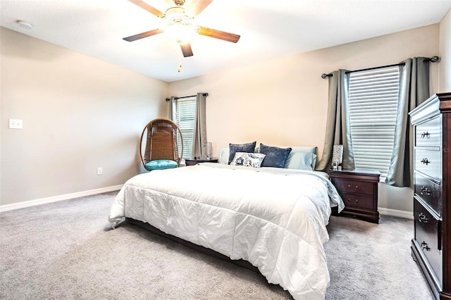 bedroom with ceiling fan and carpet