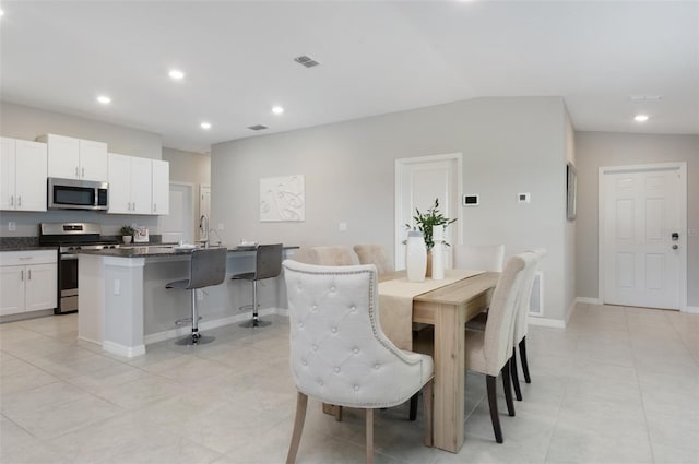 9805 Lemon Drop Loop, Sun City Center, FL 33573 - dining area featuring recessed lighting, baseboards, and light tile patterned flooring