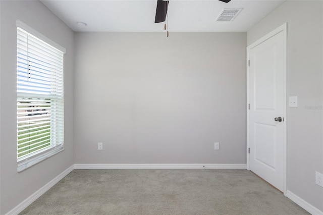9805 Lemon Drop Loop, Sun City Center, FL 33573 - empty room with a ceiling fan, light colored carpet, baseboards, and a smoke detector