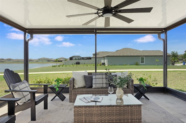 9805 Lemon Drop Loop, Sun City Center, FL 33573 - sunroom / solarium featuring a water view, ceiling fan, and an outdoor hangout area