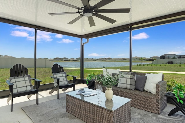 9805 Lemon Drop Loop, Sun City Center, FL 33573 - sunroom with a water view, ceiling fan, and healthy amount of natural light
