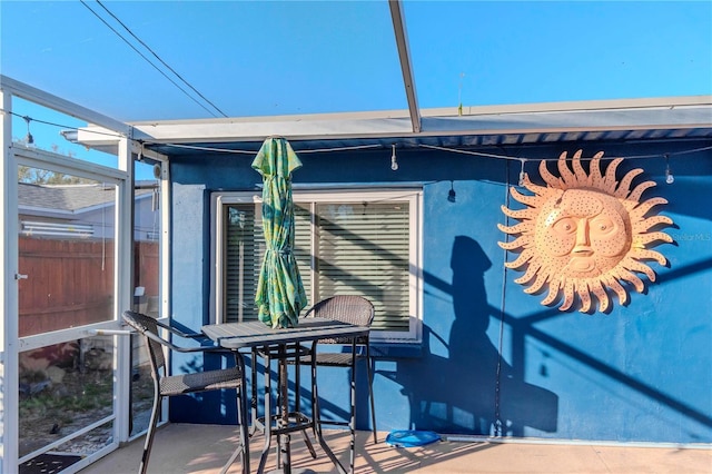 view of side of home featuring a patio area