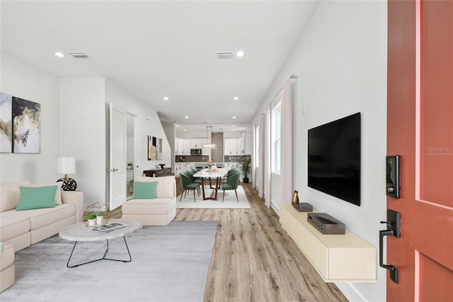 living room with light wood-type flooring