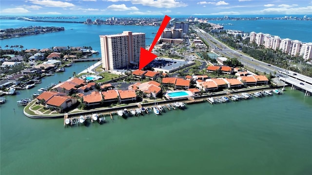 birds eye view of property featuring a water view