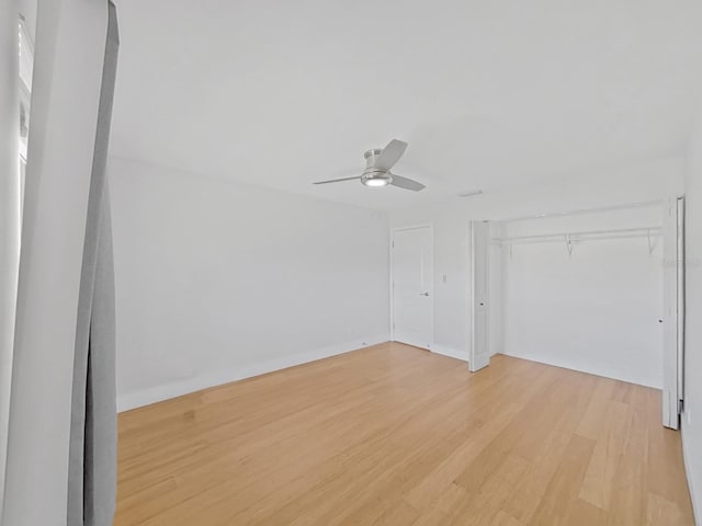 additional living space featuring light hardwood / wood-style floors and ceiling fan