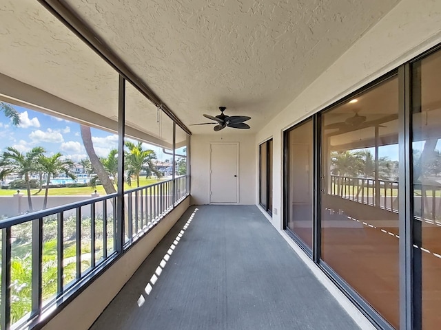 balcony featuring ceiling fan