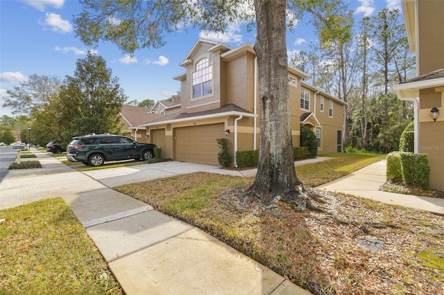 view of side of property featuring a garage