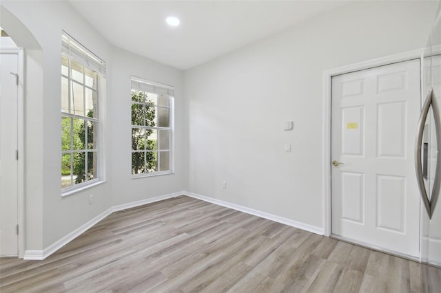 foyer with light wood-type flooring