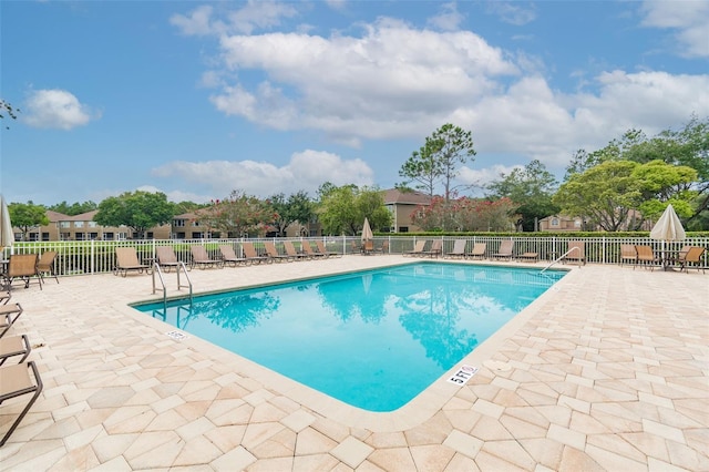 view of pool featuring a patio area