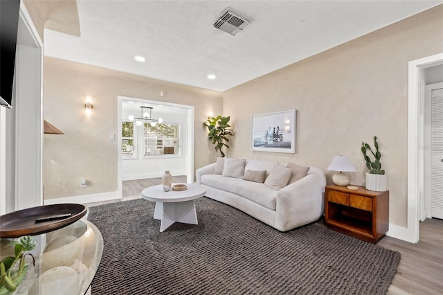 living room with hardwood / wood-style flooring