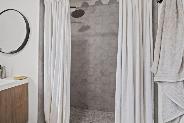 bathroom featuring vanity and a shower with shower curtain