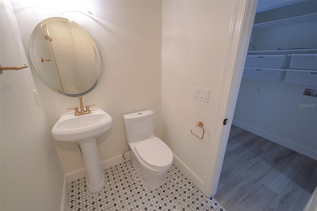 bathroom featuring toilet