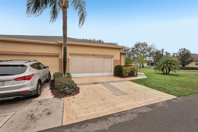 garage with a yard