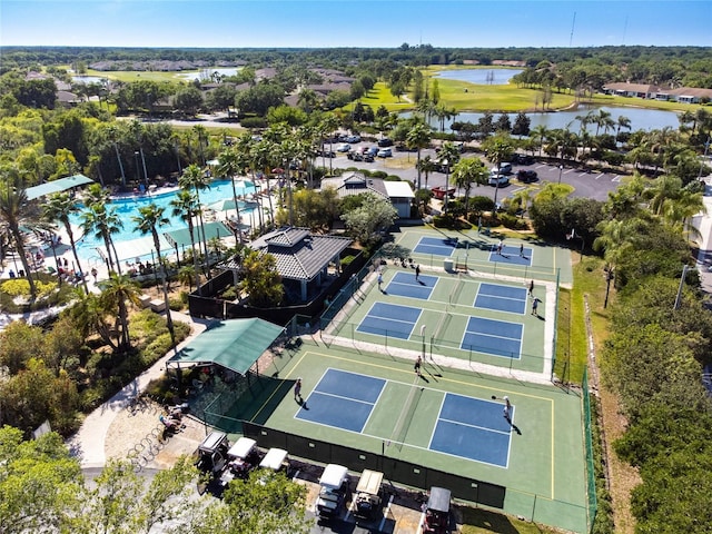 birds eye view of property with a water view