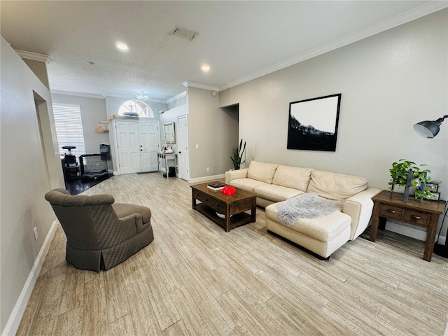 living room with light hardwood / wood-style floors and crown molding