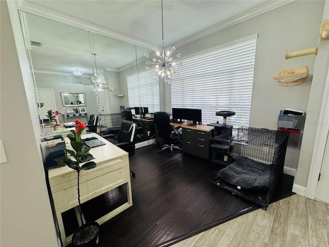 home office featuring crown molding, hardwood / wood-style floors, plenty of natural light, and a notable chandelier