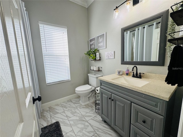 bathroom with vanity and toilet