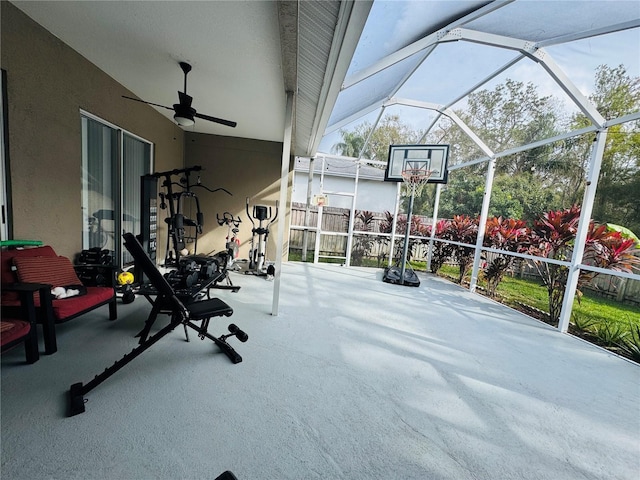 view of patio / terrace featuring ceiling fan and a lanai