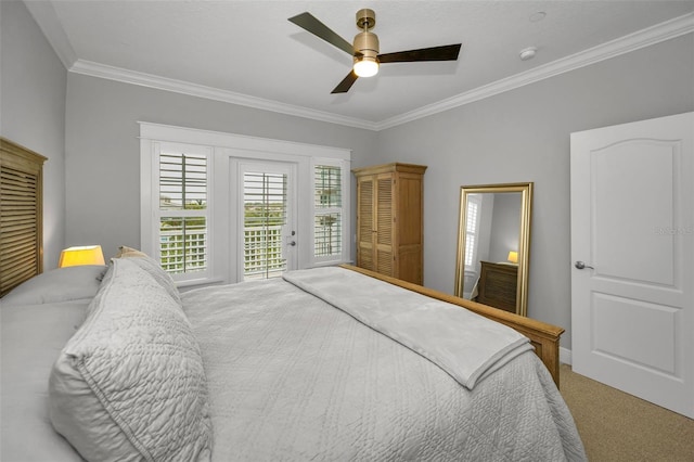 carpeted bedroom with crown molding, access to outside, and ceiling fan