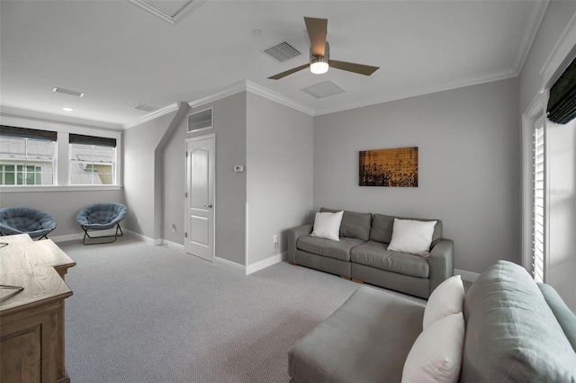 living room featuring crown molding, a wealth of natural light, and light colored carpet