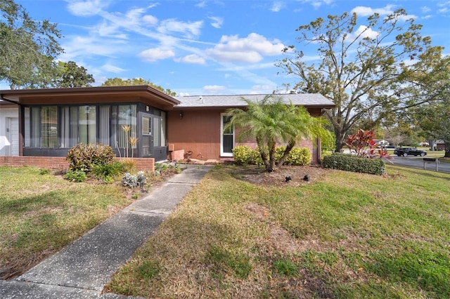 view of front of house with a front yard