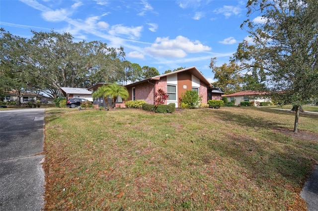 view of front of property with a front lawn