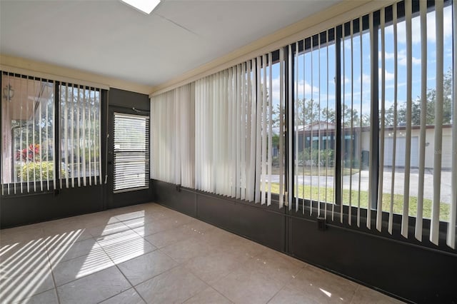 unfurnished sunroom featuring plenty of natural light