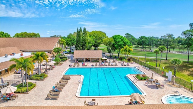 view of swimming pool with a patio