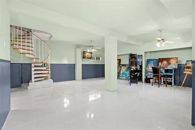 interior space featuring ceiling fan