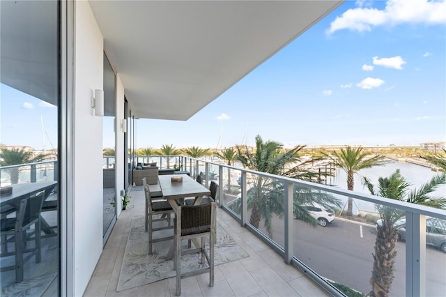 balcony featuring a water view