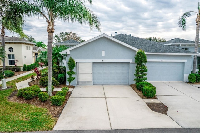 ranch-style home featuring a garage