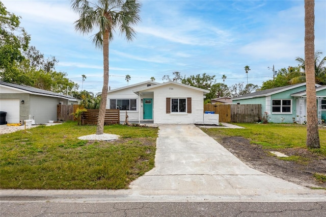 ranch-style home with a front yard