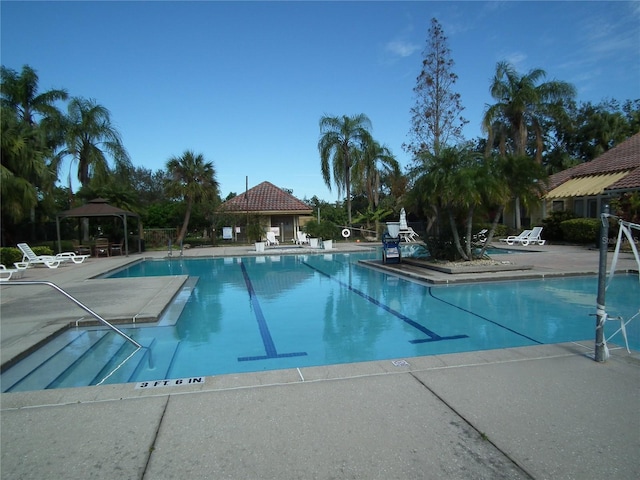 view of pool with a gazebo and a patio area