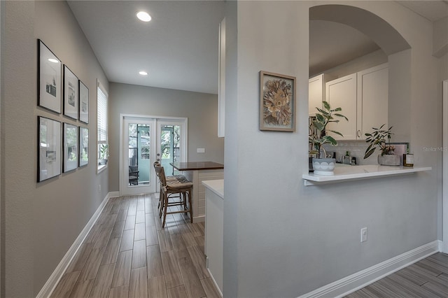 corridor featuring french doors