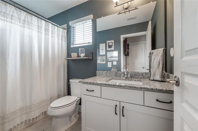 bathroom with toilet, tile patterned flooring, a shower with shower curtain, and vanity