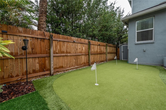 view of yard with a shed