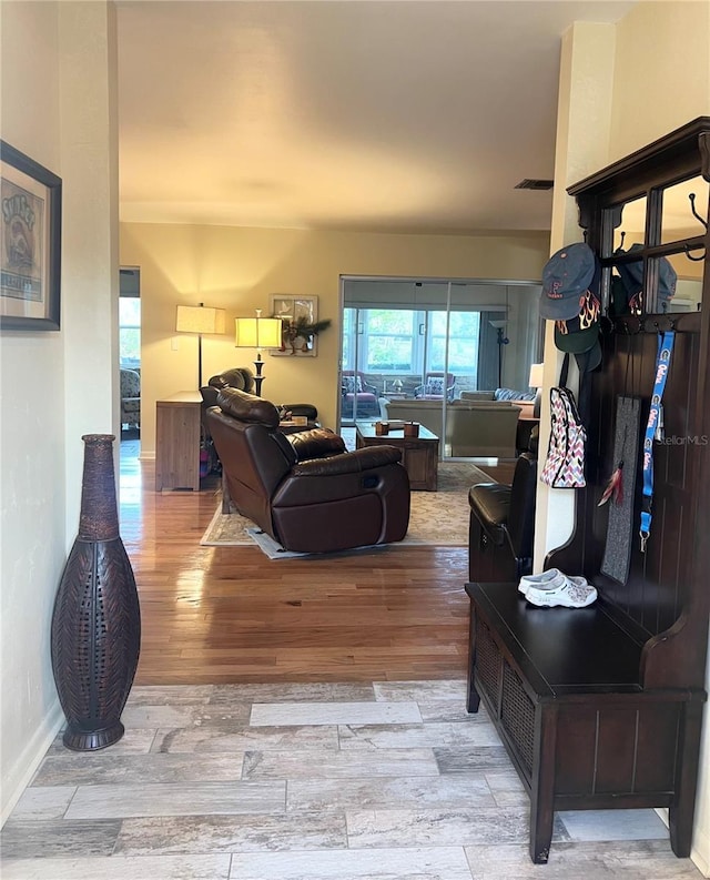 living room with light hardwood / wood-style flooring