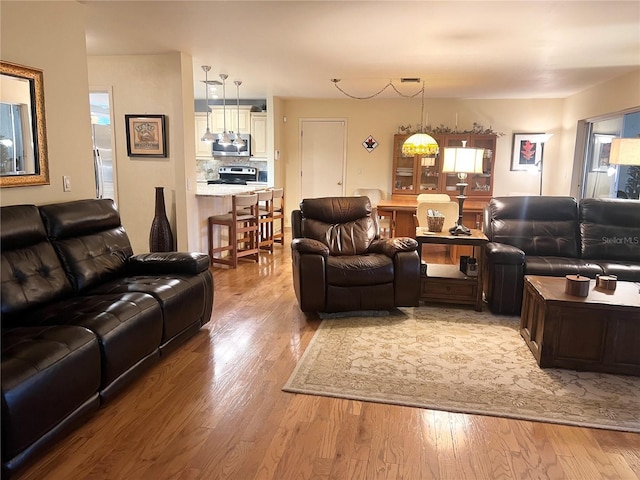 living room with wood-type flooring