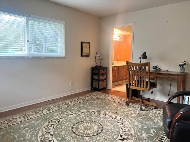 office with wood-type flooring