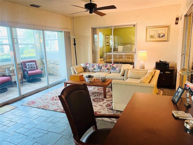 living room with ceiling fan