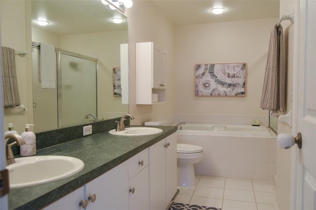 full bathroom featuring tile patterned floors, toilet, independent shower and bath, and vanity