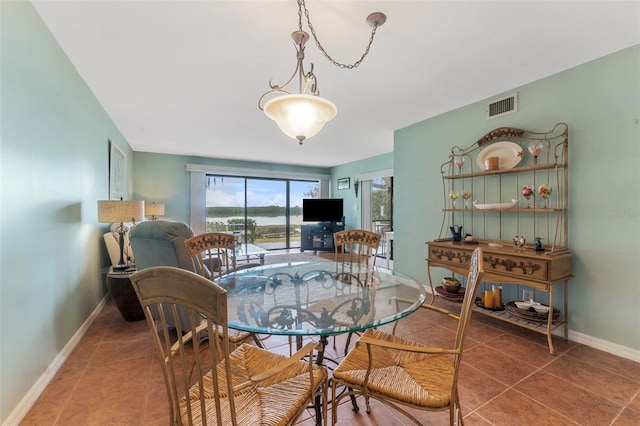 dining room featuring tile patterned flooring