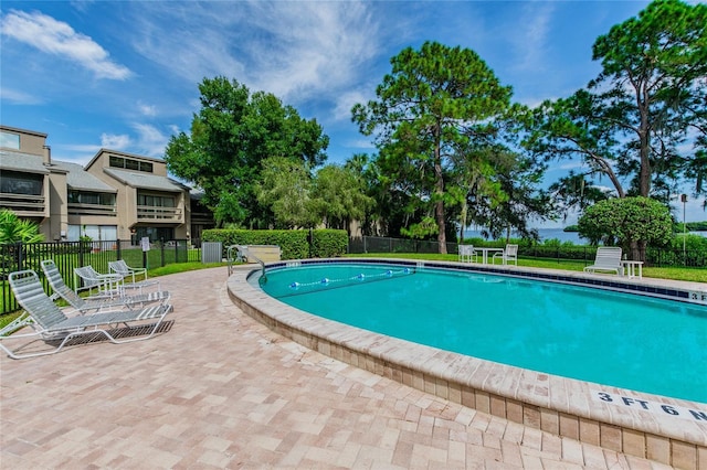 view of pool featuring a patio