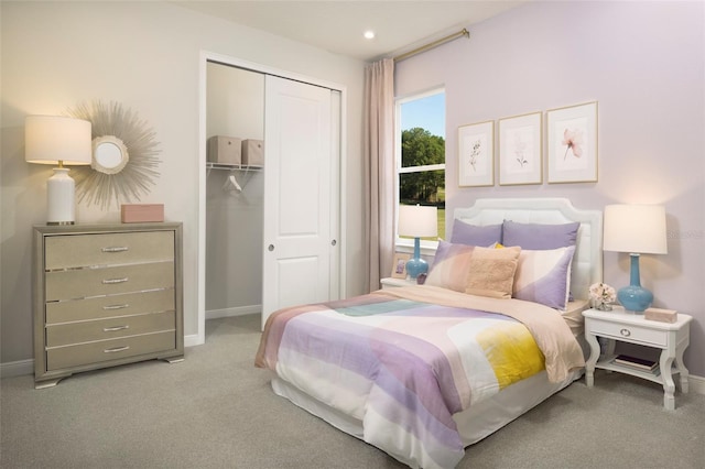 carpeted bedroom featuring a closet