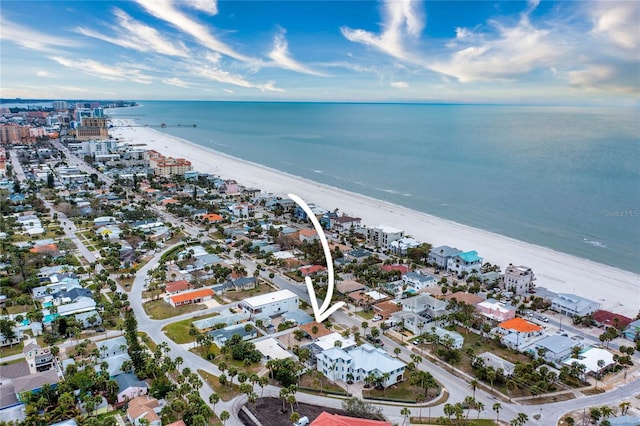 aerial view featuring a water view and a beach view