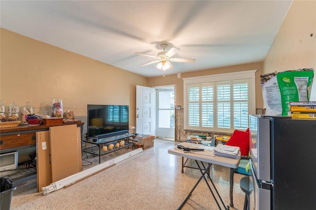 living room with ceiling fan