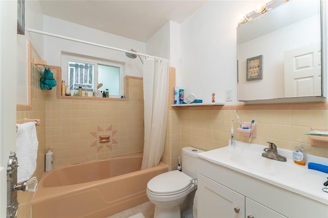 full bathroom with tile walls, toilet, vanity, and shower / bathtub combination with curtain