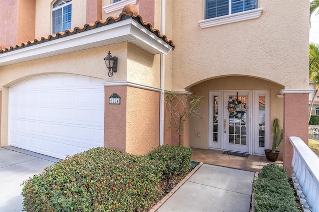 entrance to property featuring a garage