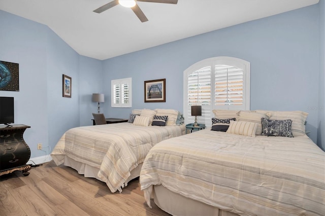 bedroom featuring light wood-type flooring and ceiling fan